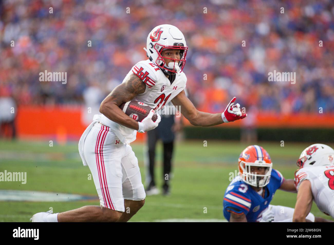 September 3, 2022: Utah Utes wide receiver Solomon Enis (21) move the ball up the field during the NCAA football game between the Utah Utes and the Florida Gators at Ben Hill Griffin Stadium Gainesville, FL. The Florida Gators defeat number 7 Utah Utes 29 to 26. Jonathan Huff/CSM. Stock Photo