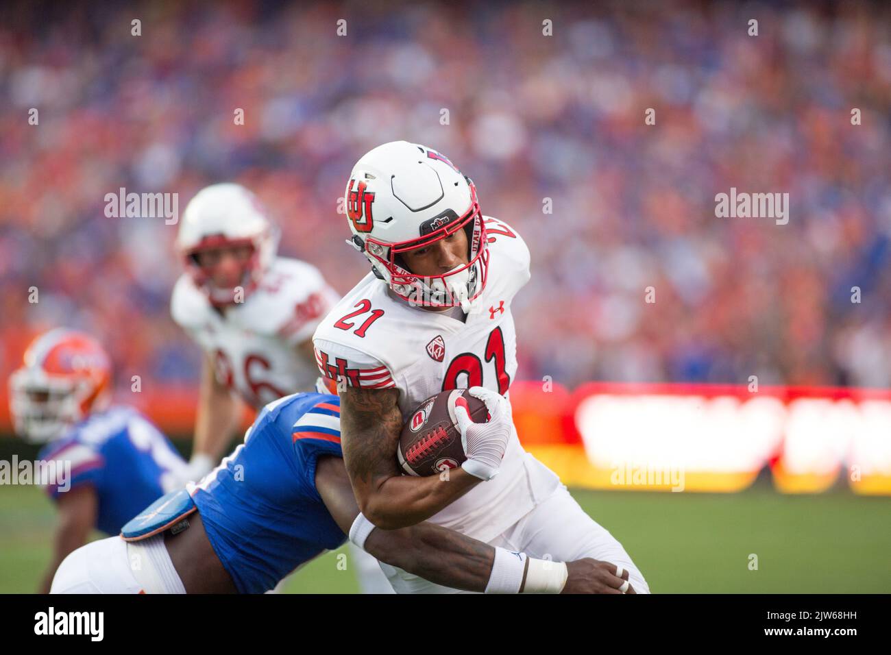 September 3, 2022: Utah Utes wide receiver Solomon Enis (21) move the ball up the field during the NCAA football game between the Utah Utes and the Florida Gators at Ben Hill Griffin Stadium Gainesville, FL. The Florida Gators defeat number 7 Utah Utes 29 to 26. Jonathan Huff/CSM. Stock Photo