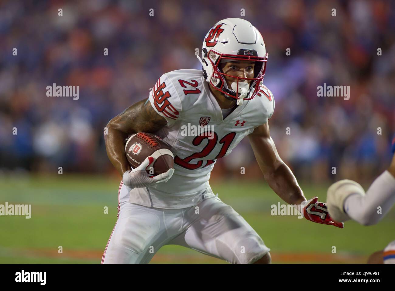 September 3, 2022: Utah Utes wide receiver Solomon Enis (21) moves the ball upfield during the NCAA football game between the Utah Utes and the Florida Gators at Ben Hill Griffin Stadium Gainesville, FL. The Florida Gators defeat number 7 Utah Utes 29 to 26. Jonathan Huff/CSM. Stock Photo