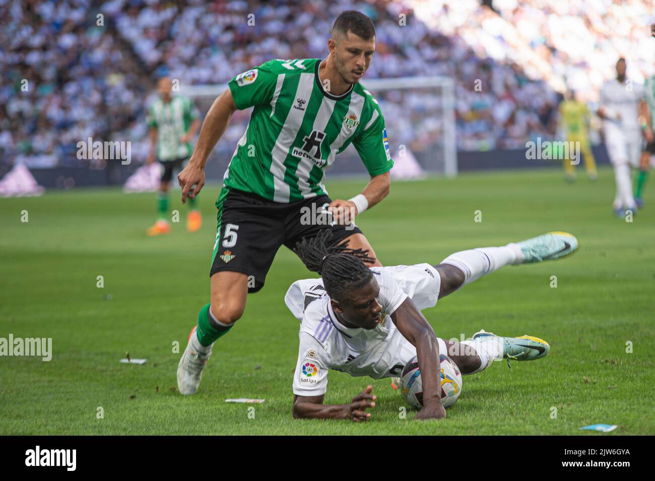 Guido Rodriguez of Real Betis (L) and Eduardo Camavinga of Real Madrid