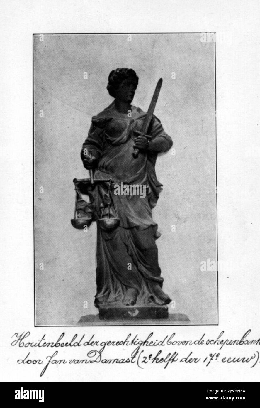 Wooden statue of justice above the ship's bank by Jan van Damast (2nd