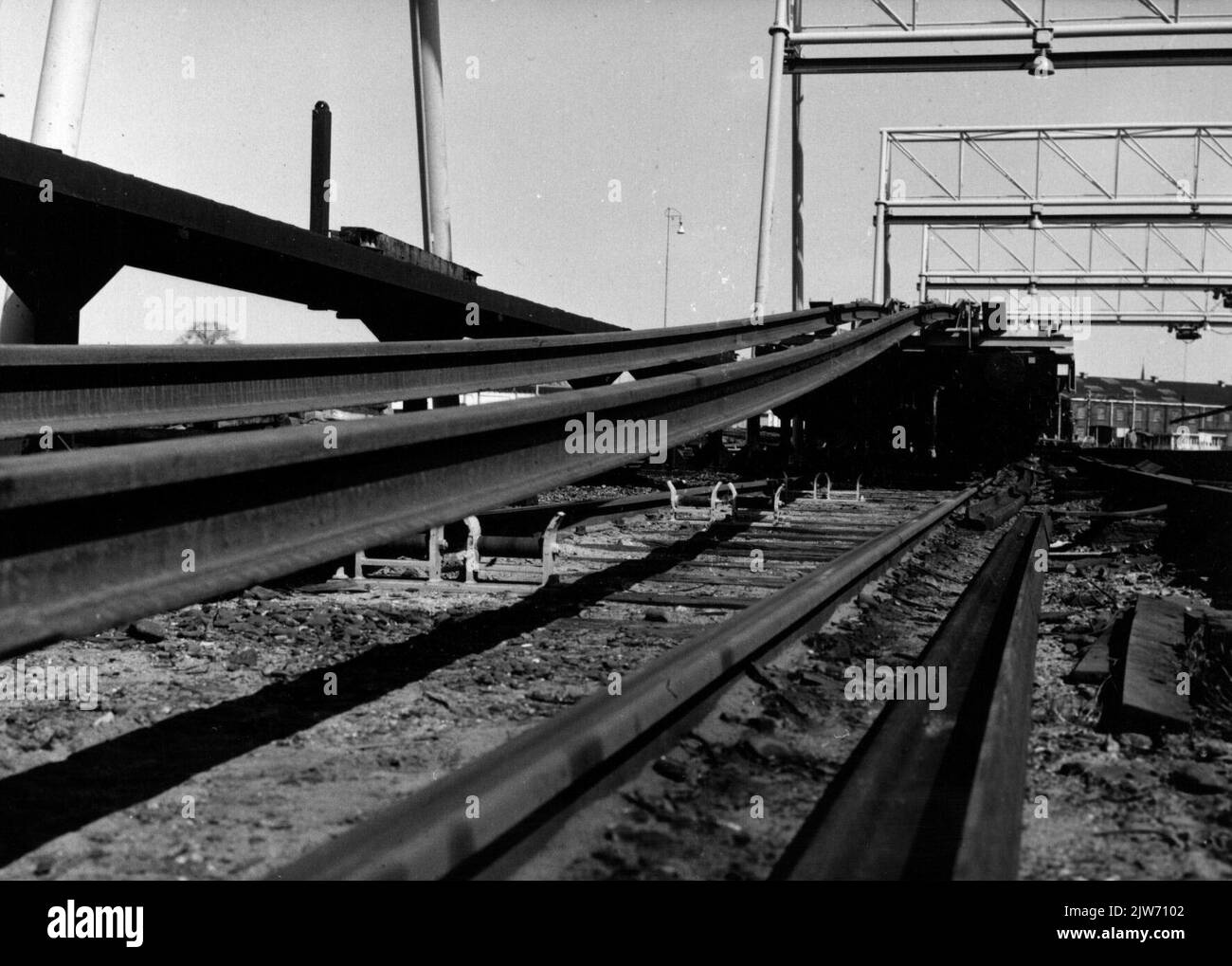 Image of the loading of a train (robe train) with rails on the site of the rail welding (SLI) of the N.S. in Utrecht. Stock Photo