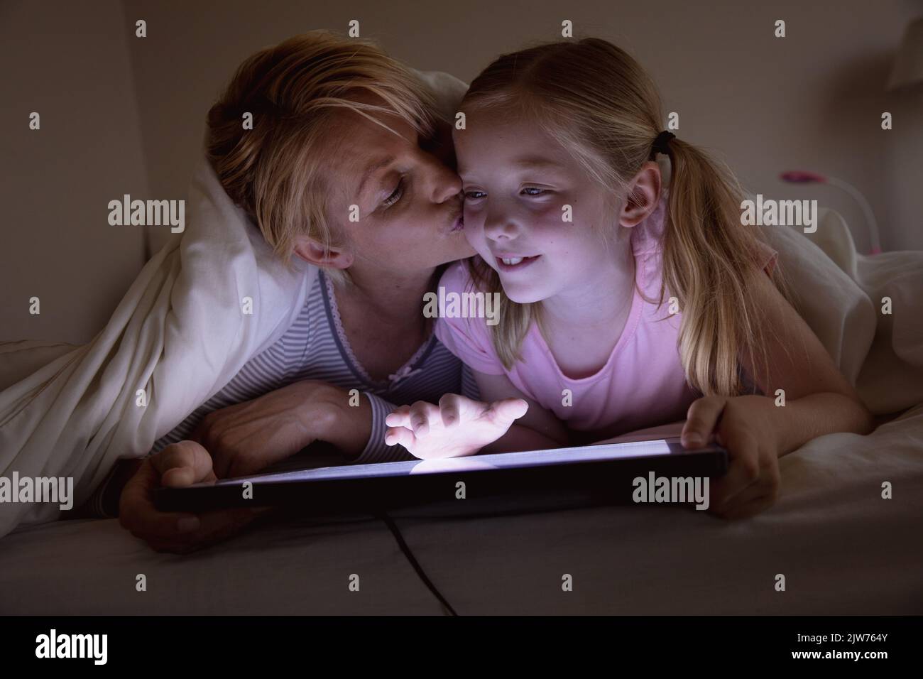 Mother and daughter using digital tablet Stock Photo
