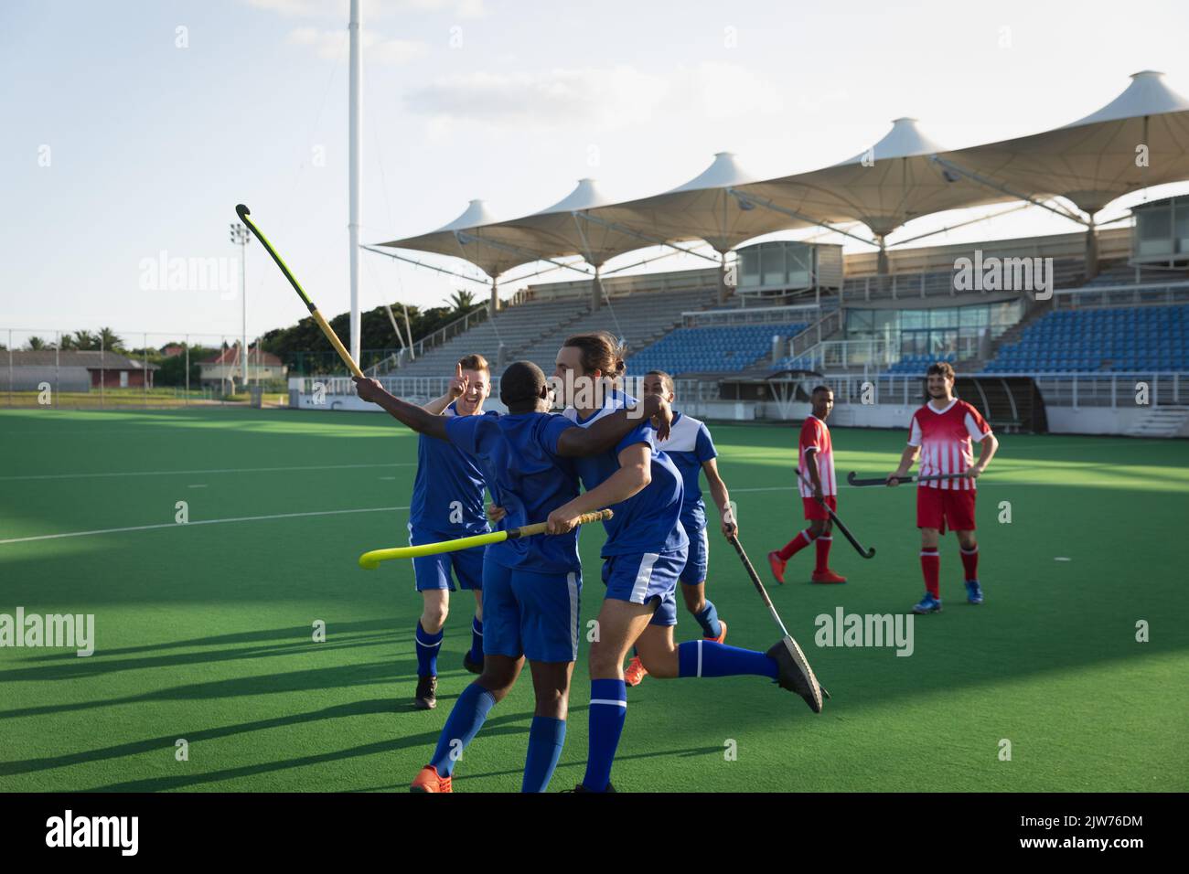 Field hockey players celebrating a victory Stock Photo Alamy