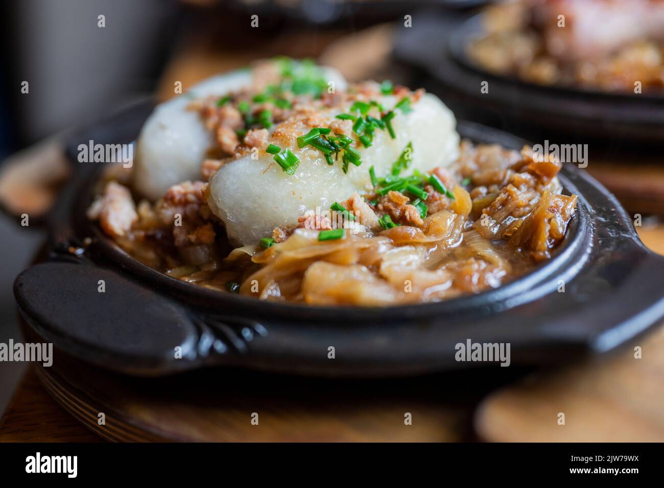national Polish dish Kartacze from semolina with meat and onions in a restaurant Stock Photo