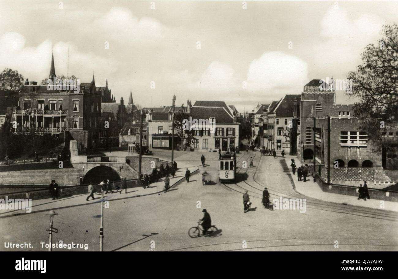 View of the Tolsteegbrug over the Stadsbuitengracht in Utrecht with a part of the Tolsteeg police station on the right (Tolsteegbrug 1). Stock Photo