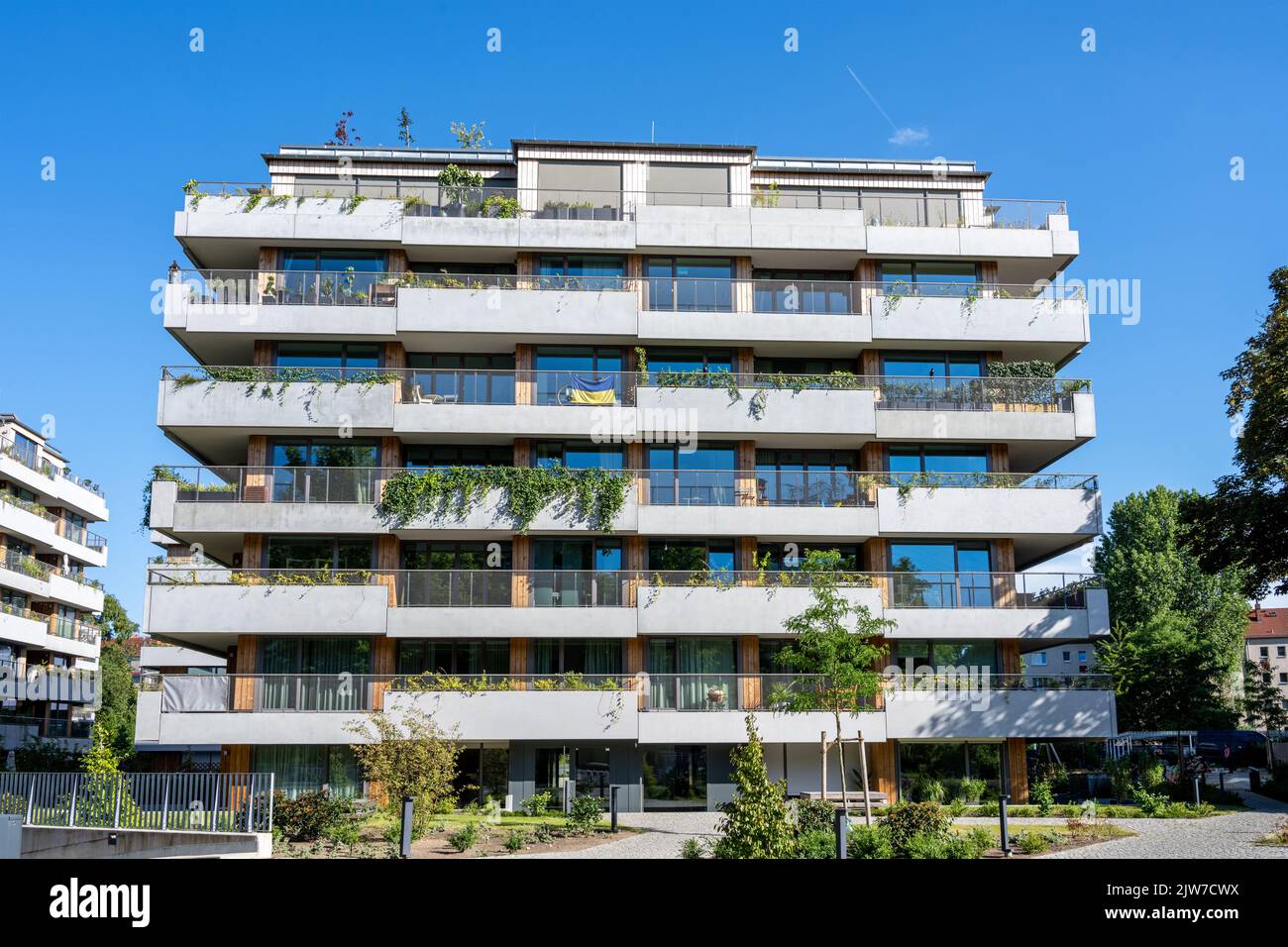Modern grey apartment house on a sunny day in Berlin, Germany Stock Photo