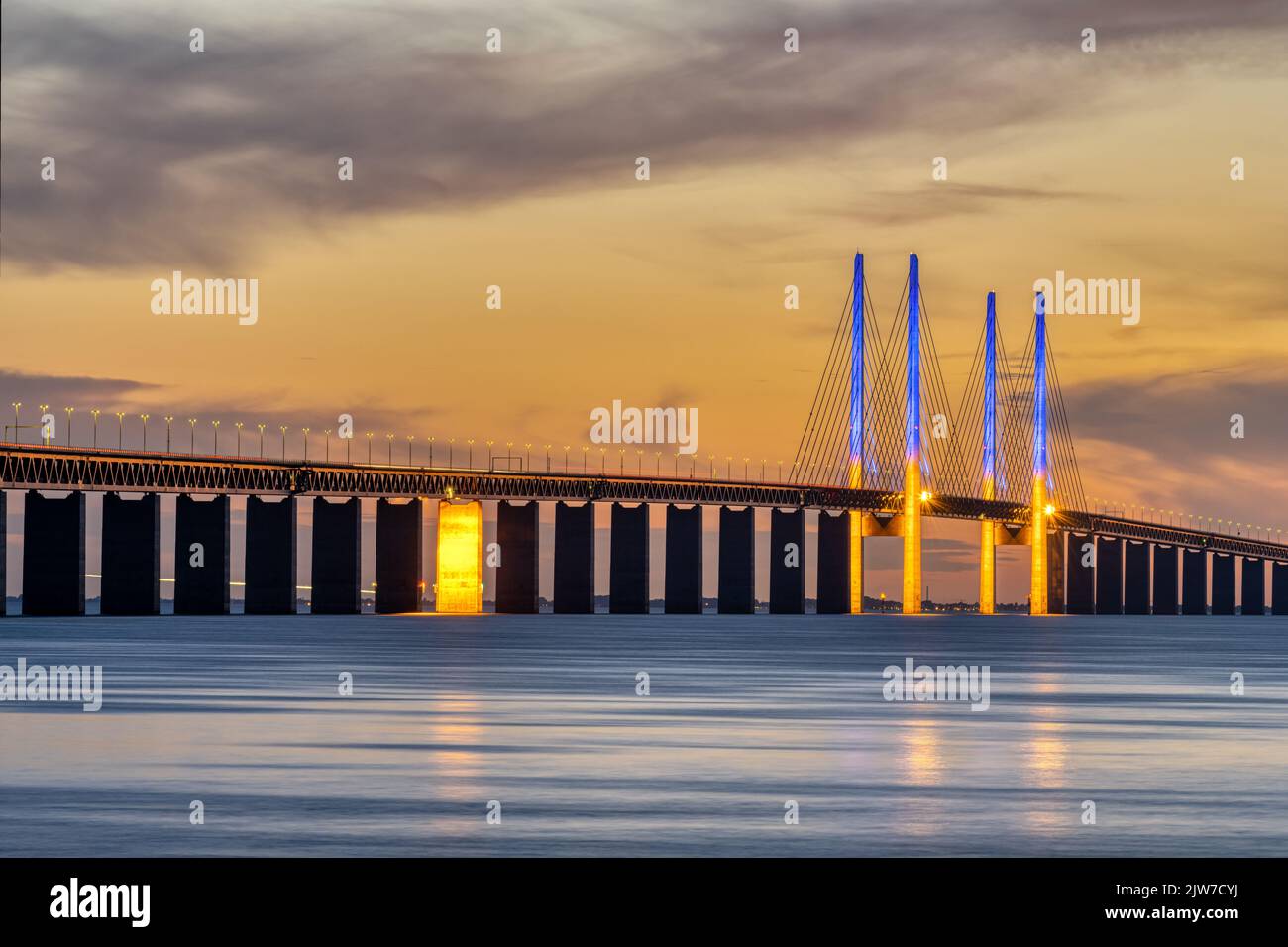 The famous Oresund bridge between Denmark and Sweden after sunset Stock Photo