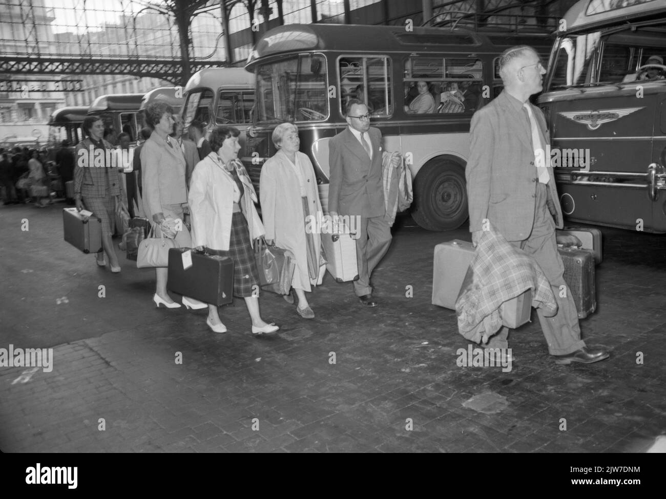 Image of Dutch tourists at a bus station in Paris. Stock Photo