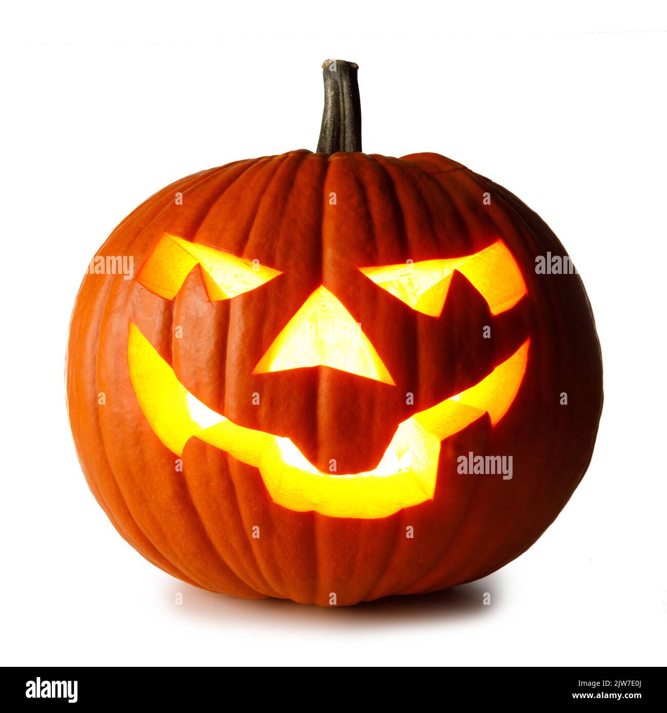 One Glowing Halloween Pumpkin isolated on white background Stock Photo