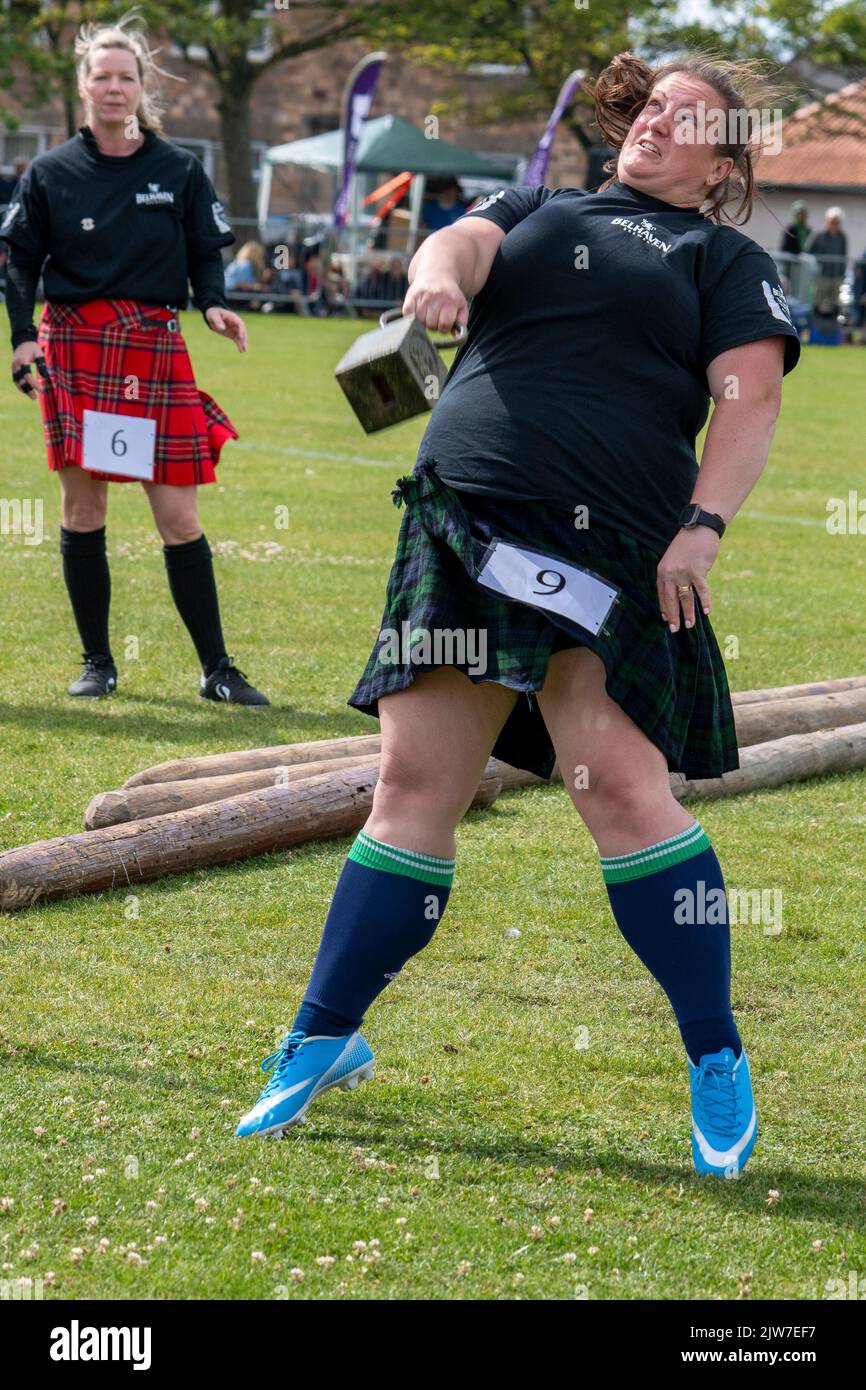 Woman's Weight over the Bar event, Highland Games, North Berwick Stock Photo