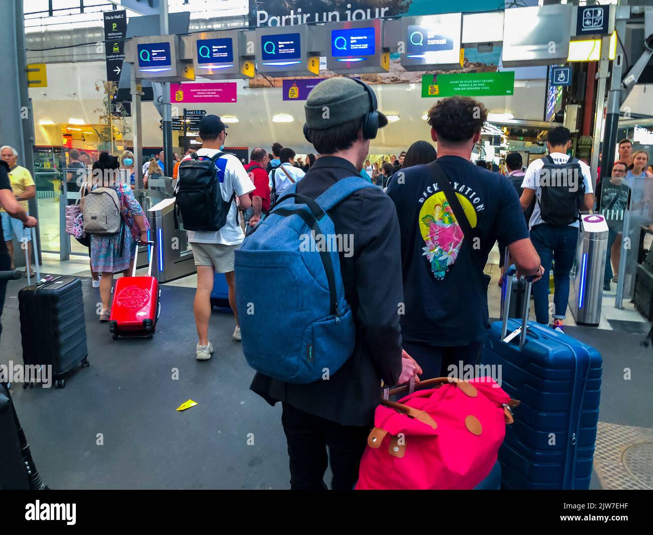 Paris, France, Crowd Passengers, Walking Away, with Suitcases, Bags
