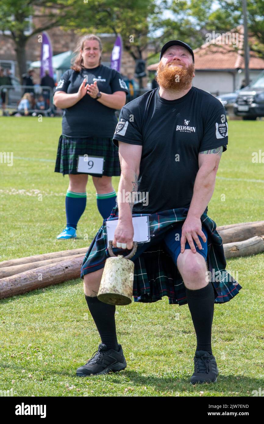 Men's Weight over the Bar event, Highland Games, North Berwick Stock Photo