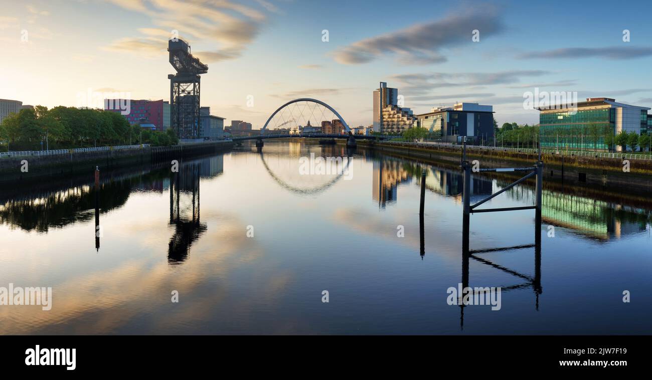 Glasgow skyline panorama at sunrise over river Clyde, Scotland Stock Photo