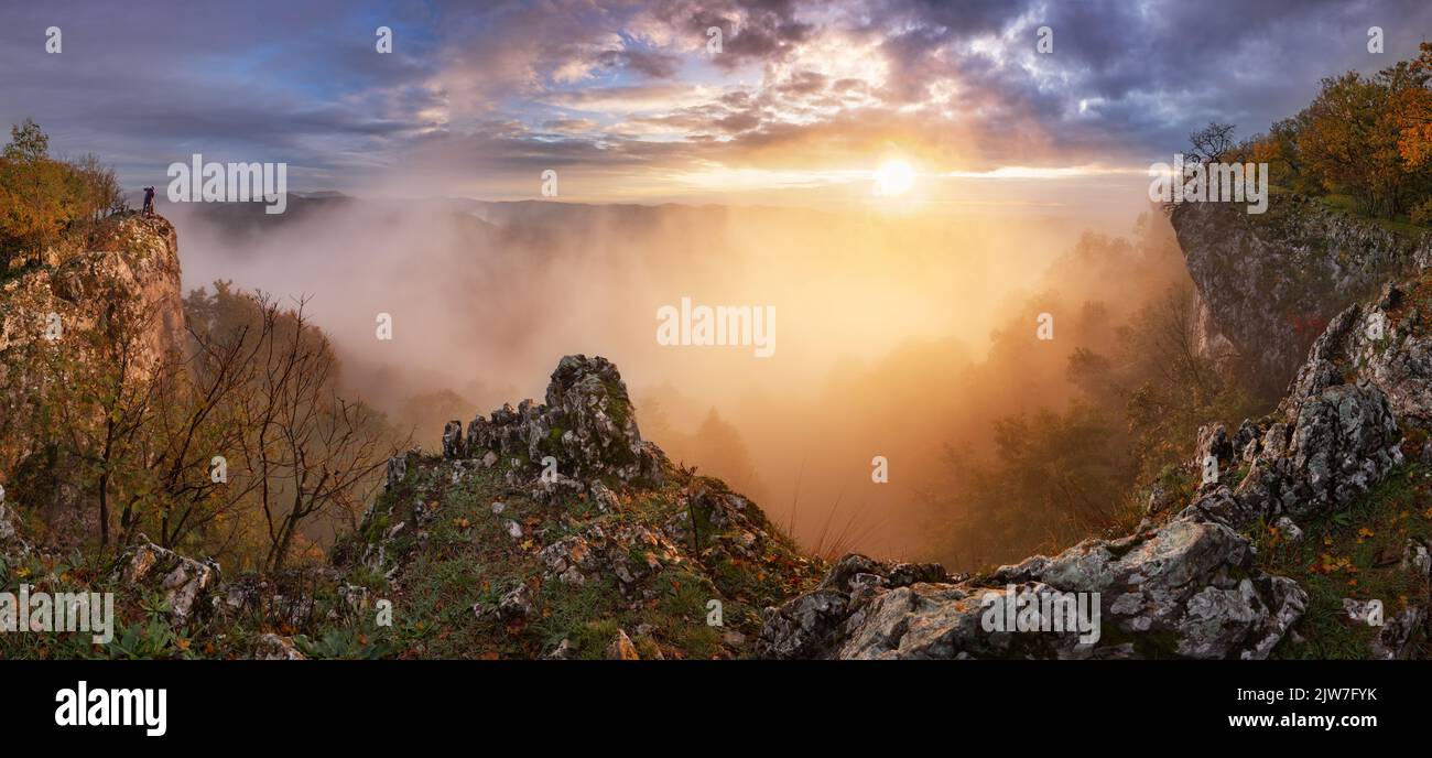 Beautiful autumn morning on the view point above the deep forest valley in Carpathian, Slovakia Stock Photo