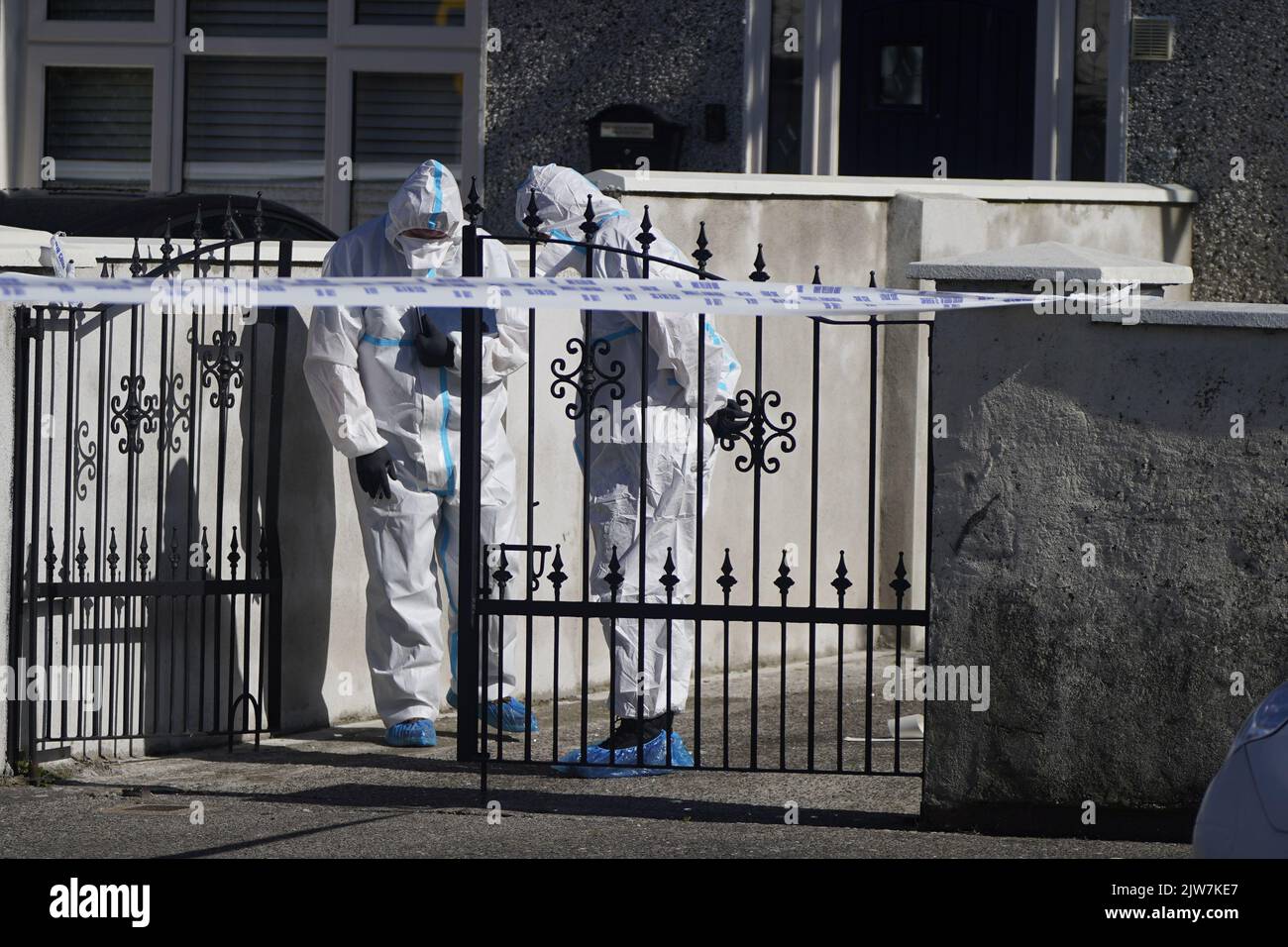 Forensic officers at the scene in the Rossfield Estate in Tallaght
