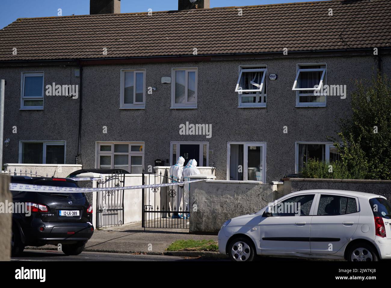 Forensic officers at the scene in the Rossfield Estate in Tallaght