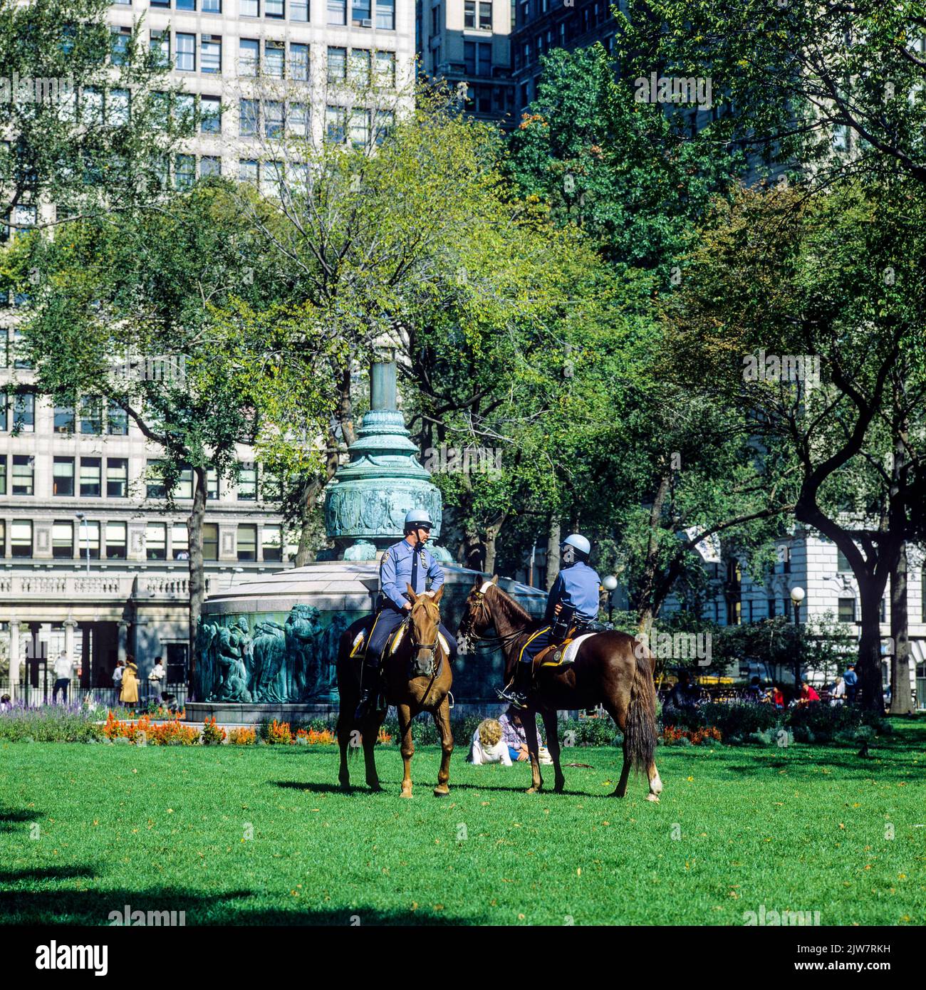 New York, 1980s, 2 NYPD police officers on horseback, Independence flagstaff, Union square park, Manhattan, New York City, NYC, NY, USA, Stock Photo