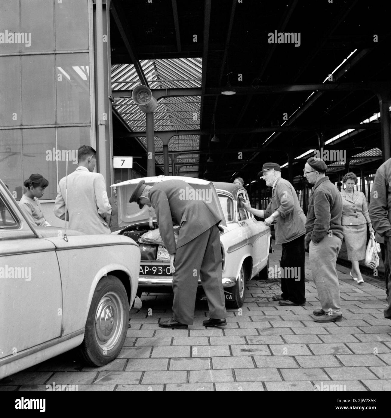 Image of the inspection of a car by a customs officer at the ...