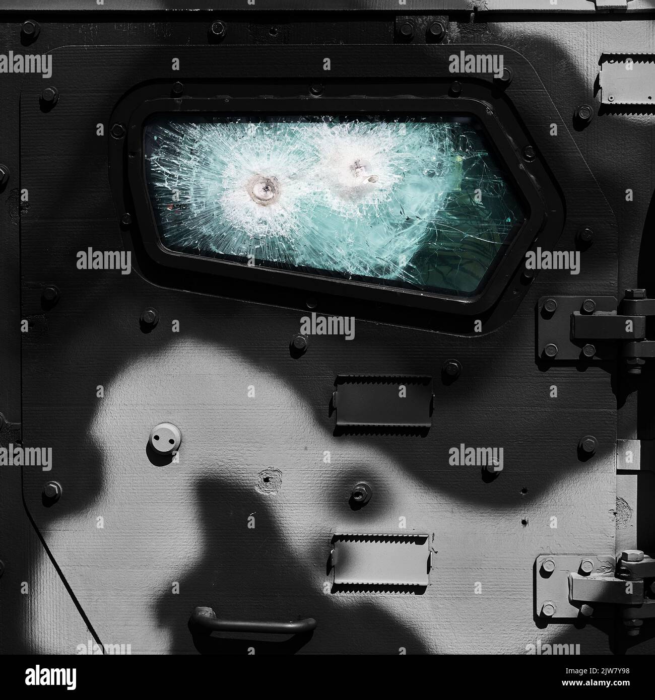 Armored car after the shelling. Bulletproof glass. Armored glass after