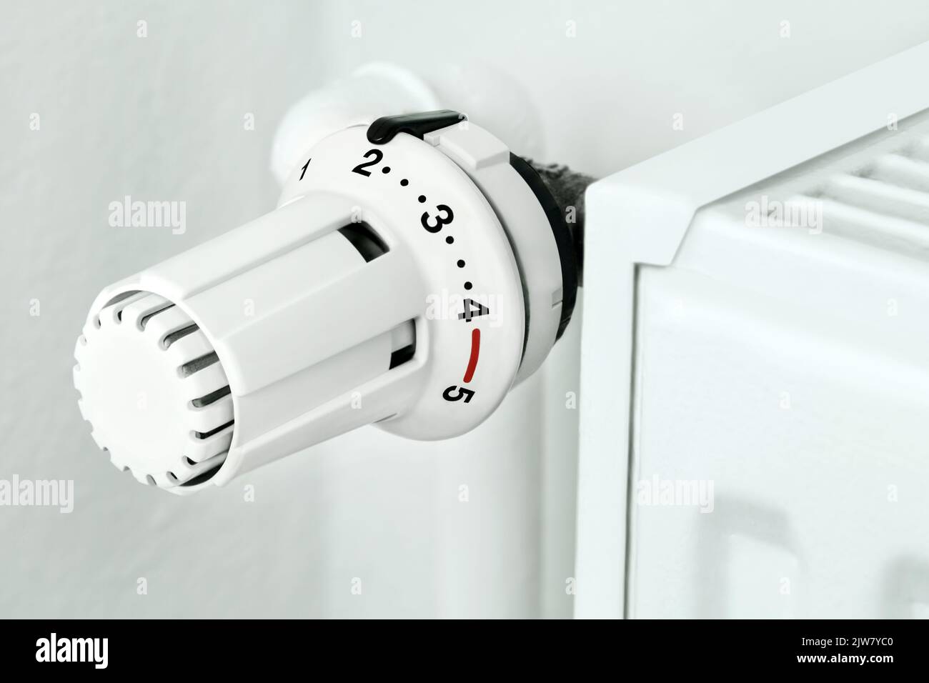 White heater and thermostat close up Stock Photo