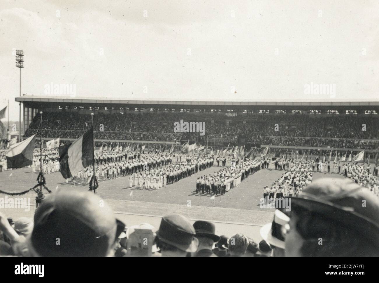 View of the Jubel Stadium in Brussels with the associations that will participate in the gymnastics tournament organized because of the 70-year anniversary of the Royal Belgian Turnbond.n.b. The gymnastics parties were held from 19 to 23 July in the Jubel Stadium (later Heysel Stadium and then King Baudouin Stadium) and the Utrechtsche Gymnastiek- and screen association Bato was one of the participating teams. Stock Photo