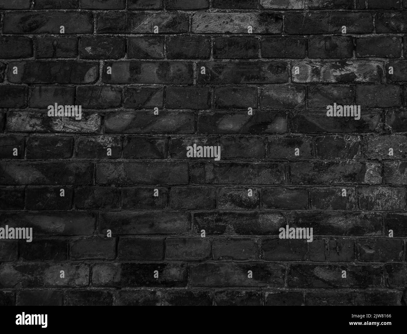 Dark black brick wall texture background Stock Photo Alamy