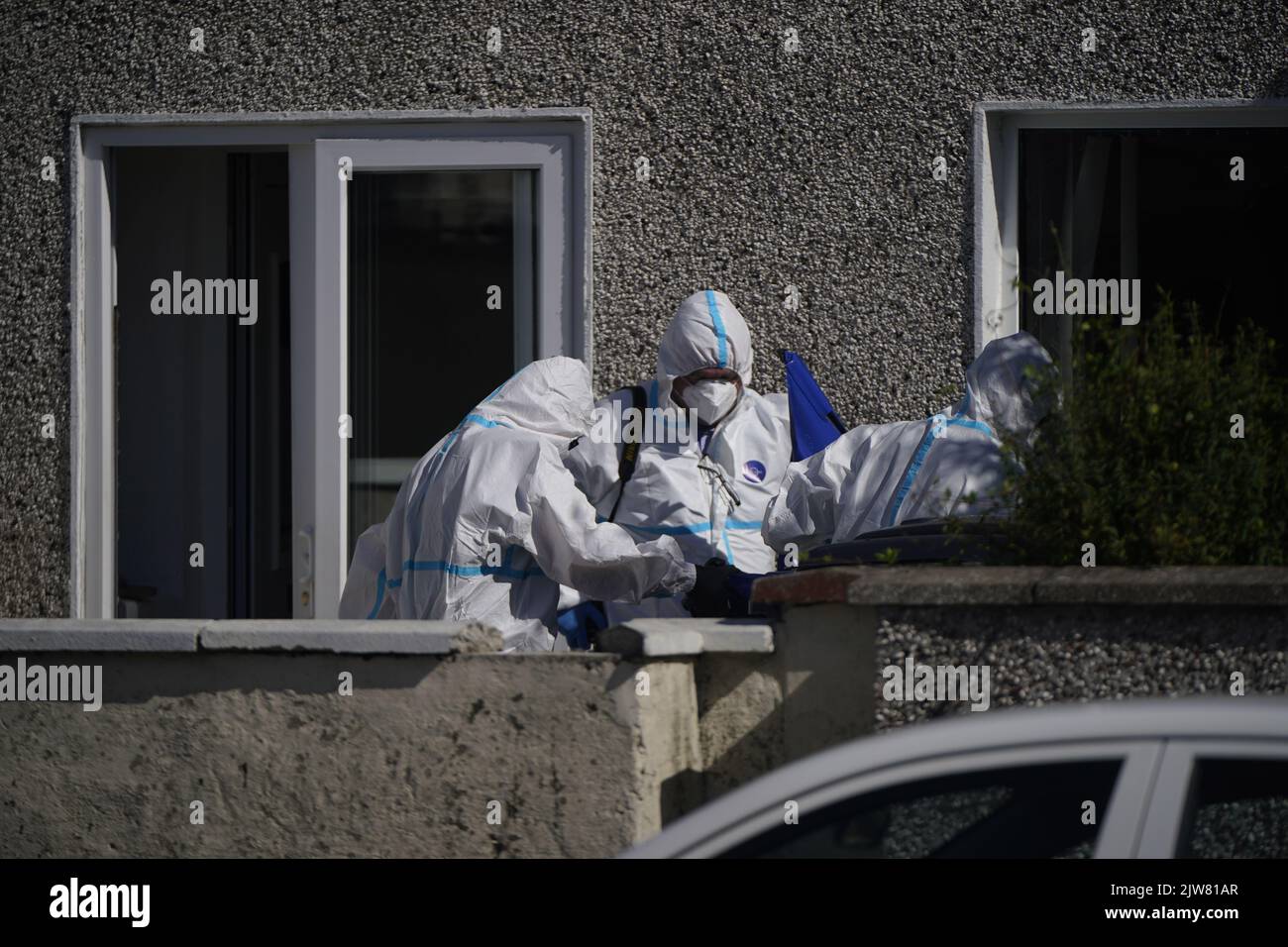 Forensic officers at the scene in the Rossfield Estate in Tallaght