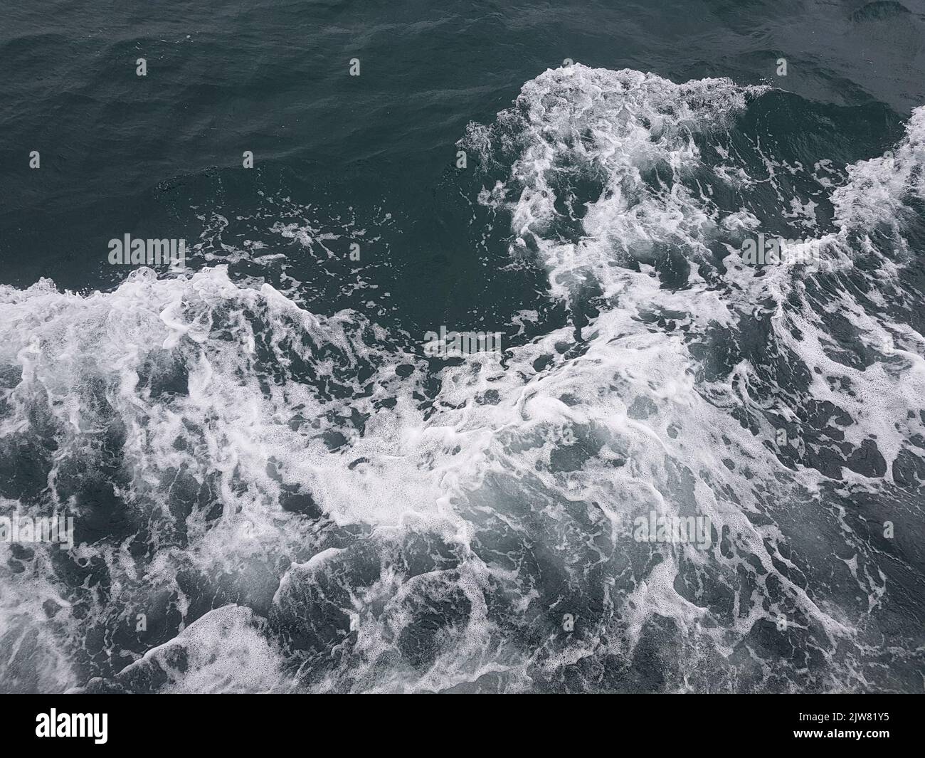 Surface of blue water Sea wave Colored background Stock Photo - Alamy