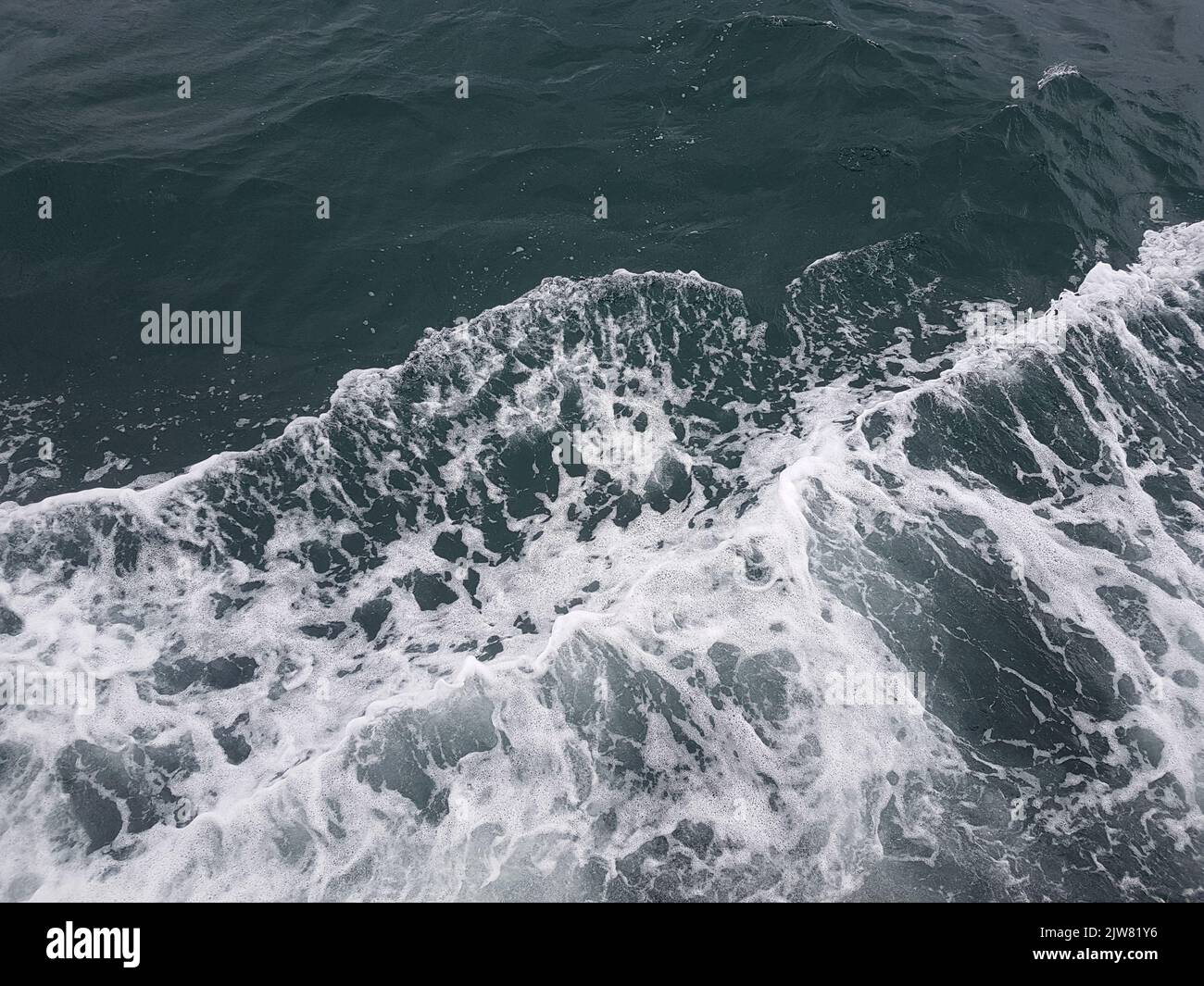 Surface of blue water Sea wave Colored background Stock Photo - Alamy