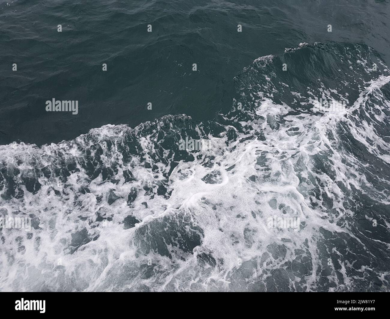 Surface of blue water Sea wave Colored background Stock Photo - Alamy