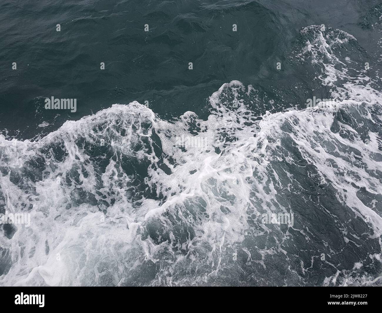 Surface of blue water Sea wave Colored background Stock Photo - Alamy