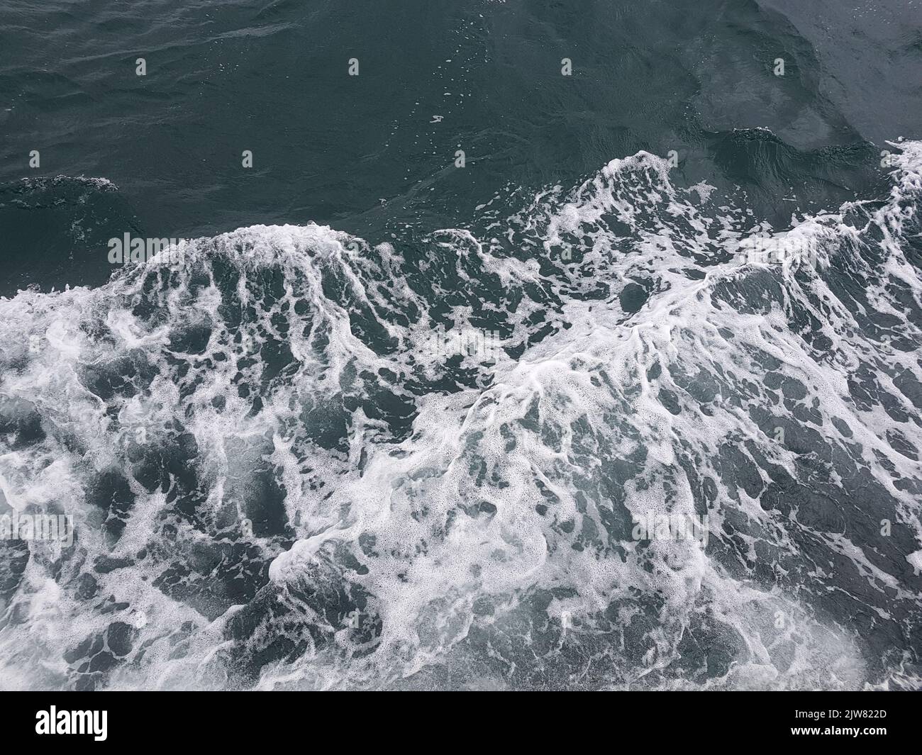 Surface of blue water Sea wave Colored background Stock Photo - Alamy
