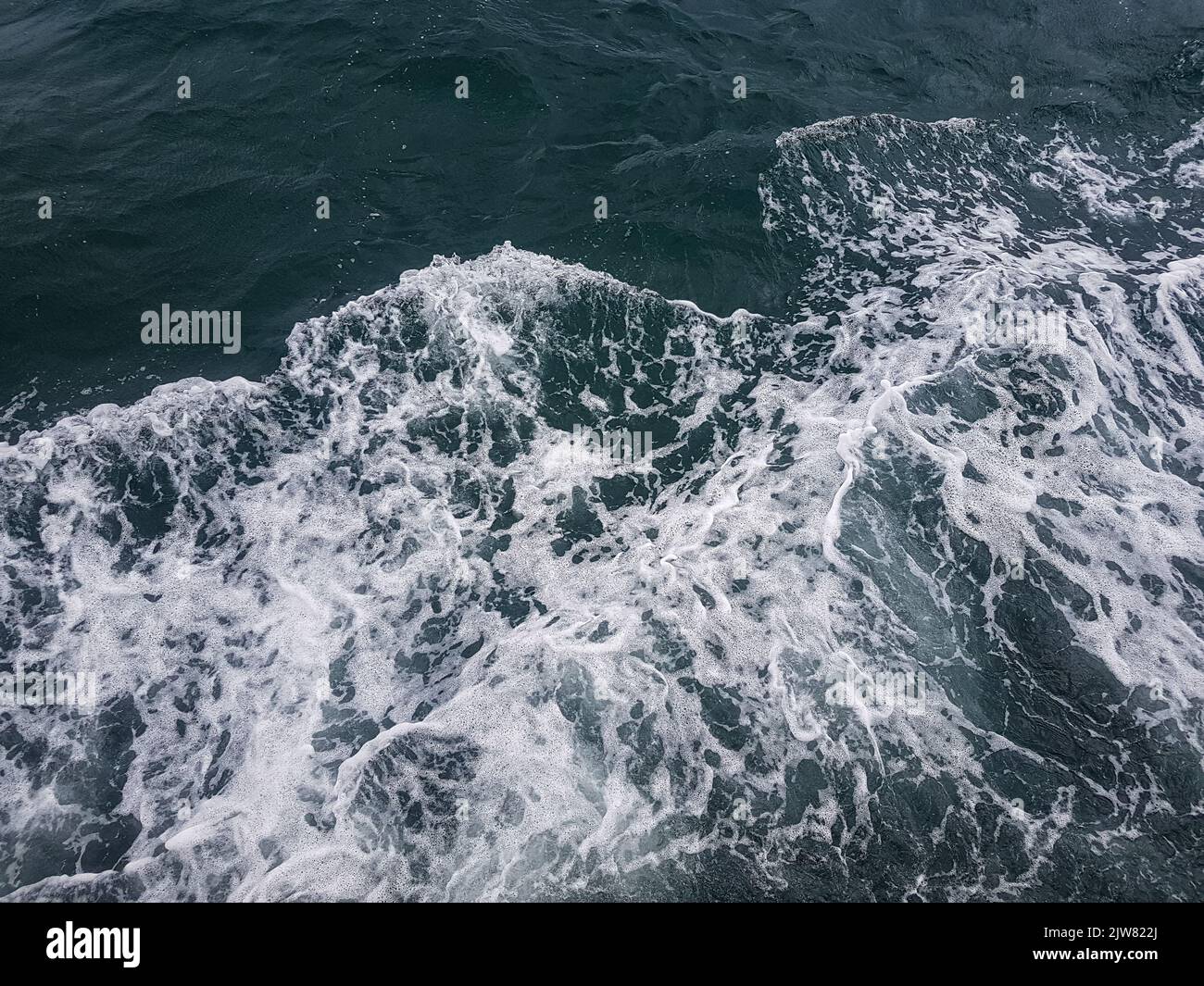 Surface of blue water Sea wave Colored background Stock Photo - Alamy