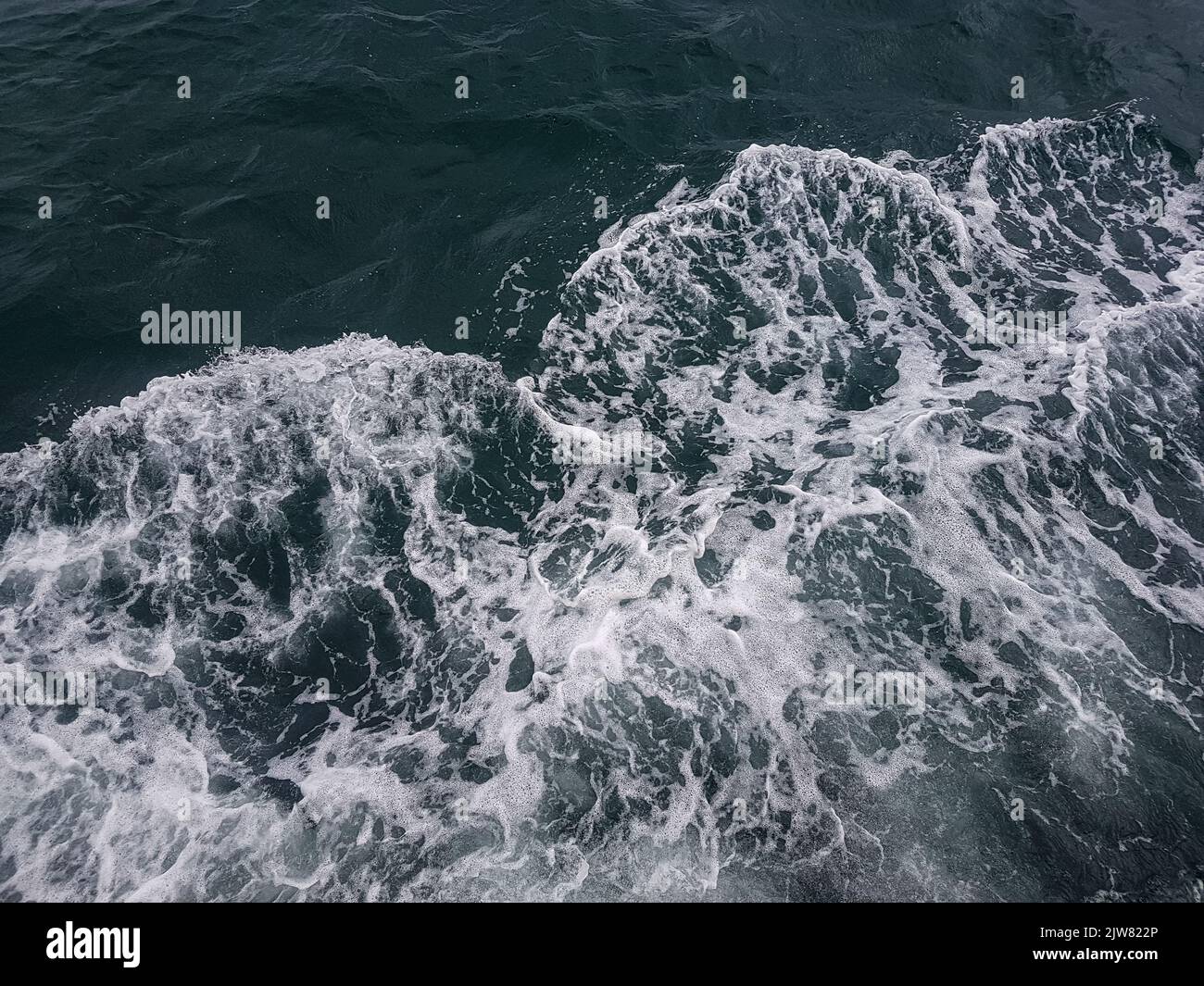 Surface of blue water Sea wave Colored background Stock Photo - Alamy