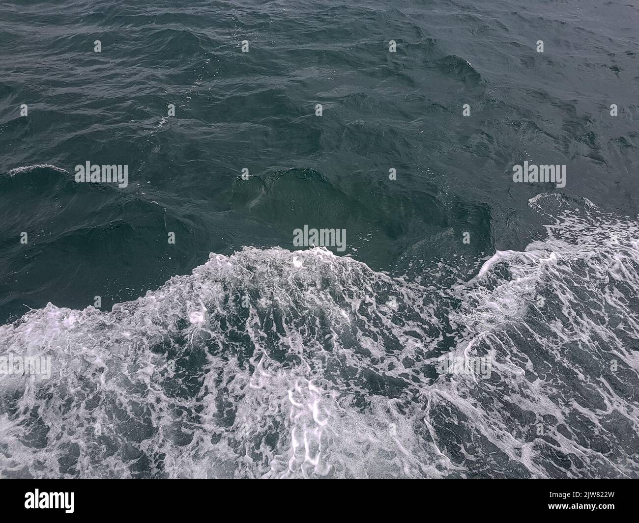 Surface of blue water Sea wave Colored background Stock Photo - Alamy