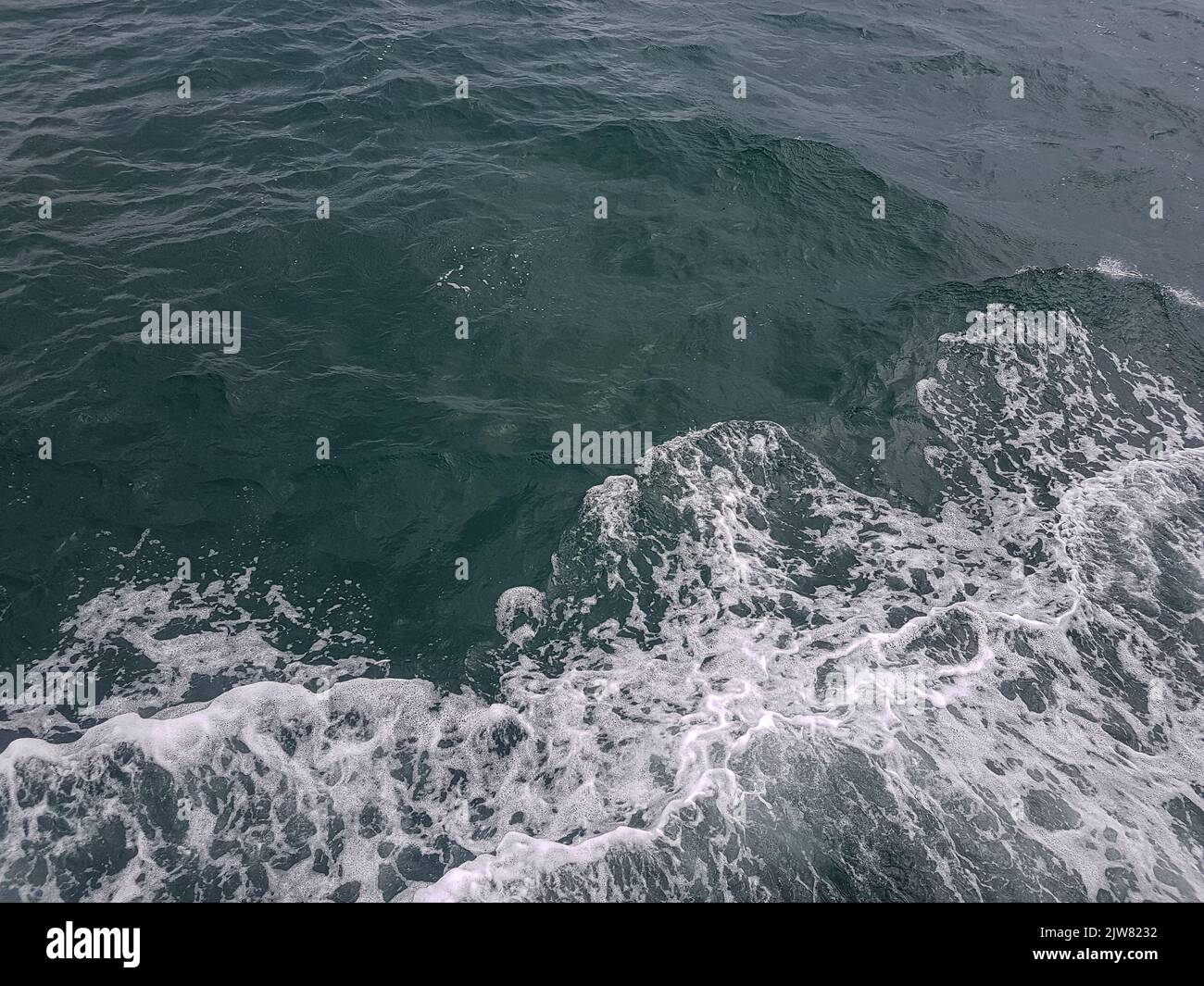 Surface of blue water Sea wave Colored background Stock Photo - Alamy