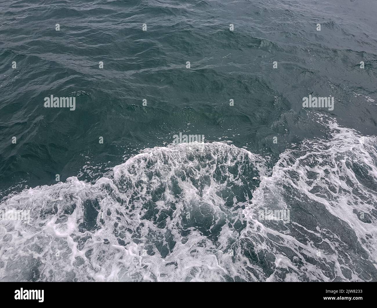 Surface of blue water Sea wave Colored background Stock Photo - Alamy
