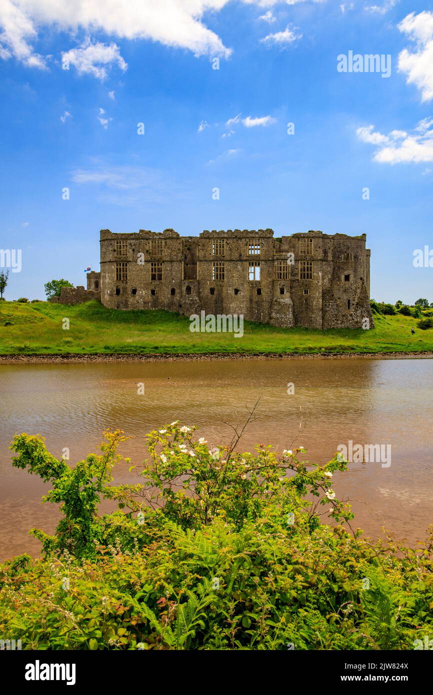 The 13th century Carew Castle ruins on the banks of the Carew River, Pembrokeshire, Wales, UK Stock Photo