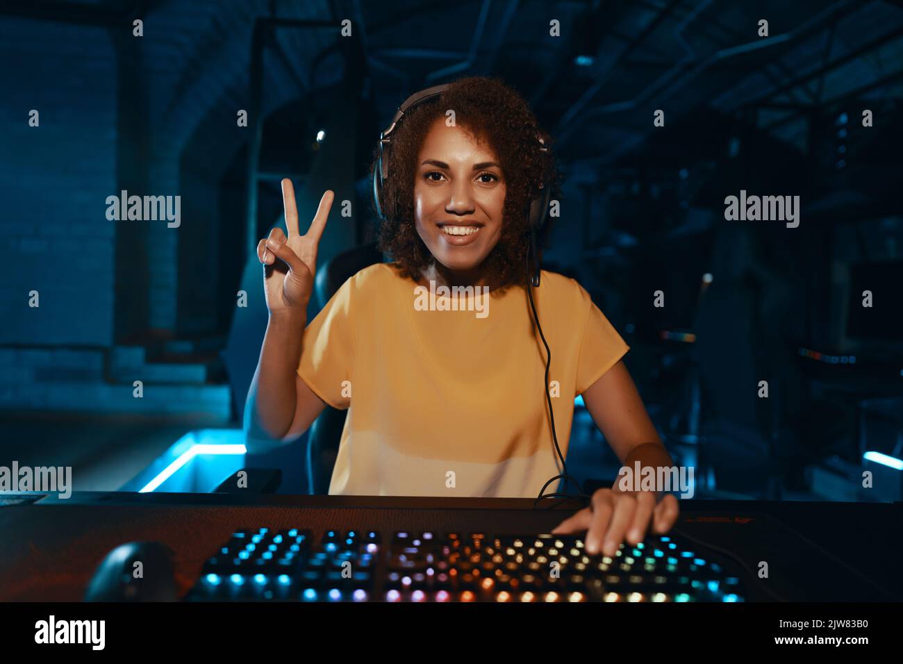 Excited young woman plays hi-res stock photography and images - Alamy