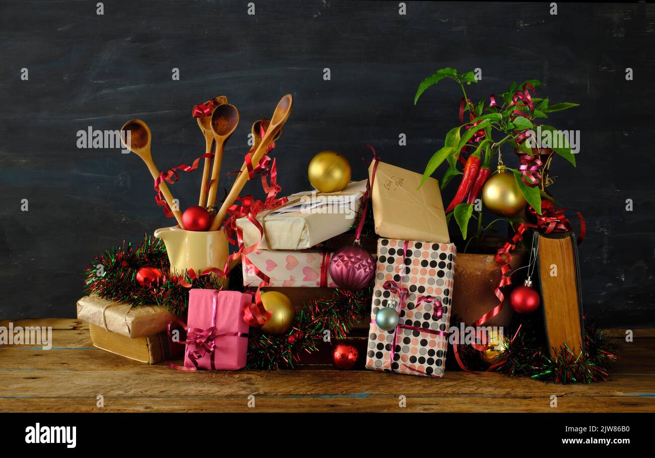 cookbooks and recipe books as christmas gift,cooking,culinary,food,reading,literature,christmas,holiday cpncept.Festive decoration and cooking tools Stock Photo