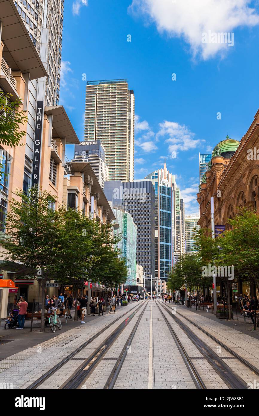 Sydney, Australia - April 16, 2022: George street viewed towards South on with modern skyscrapers can be seen on the background on a day Stock Photo