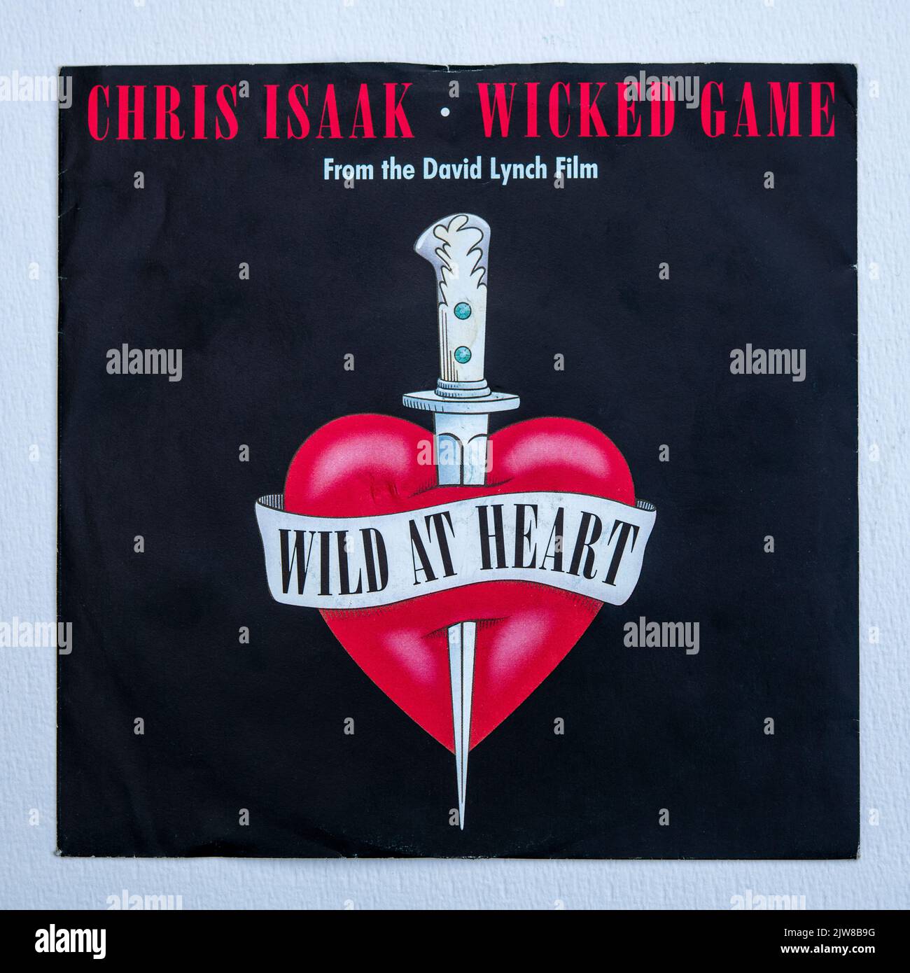 Picture cover of the seven inch single version of Wicked Game by Chris Isaak, which was released in 1989. Stock Photo