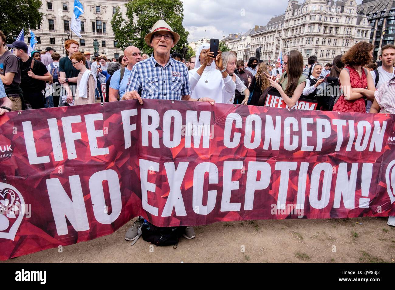 London, UK. 3 September 2022. Members of anti-abortion groups rally in Parliament Square, Westminster following an annual 'March For Life' in central London. Pro-choice abortion campaigners also gather to voice their opposition to the anti-abortion movement. Pictured: The central message of the anti-abortion campaigners of Life from Conception, No Exception on display at the rally. Stock Photo