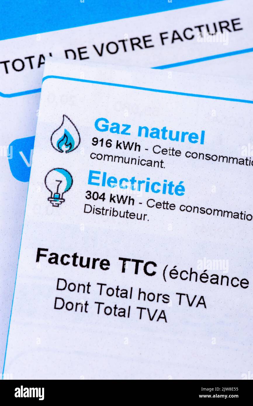 Rise of energy prices in France: close-up of a French invoice with details of the natural gas and electricity consumptions to be paid measured in kWh Stock Photo