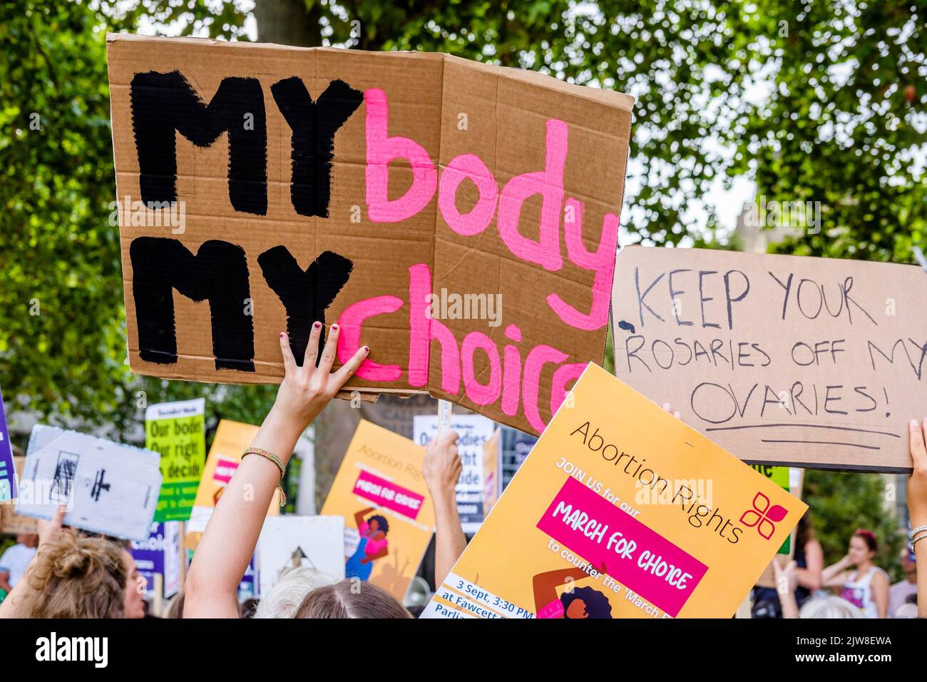 London, UK. 3 September 2022.  Pro-choice abortion campaigners display messaging of women's rights to choose during a March for Choice rally in Parliament Square in opposition to a rally also being held by anti-abortion campaign groups. Stock Photo