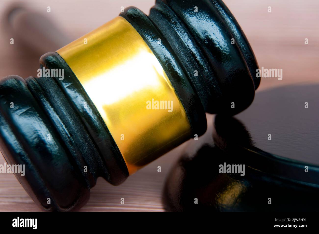 Close up of gavel with wooden background. Copy space and law concept. Stock Photo