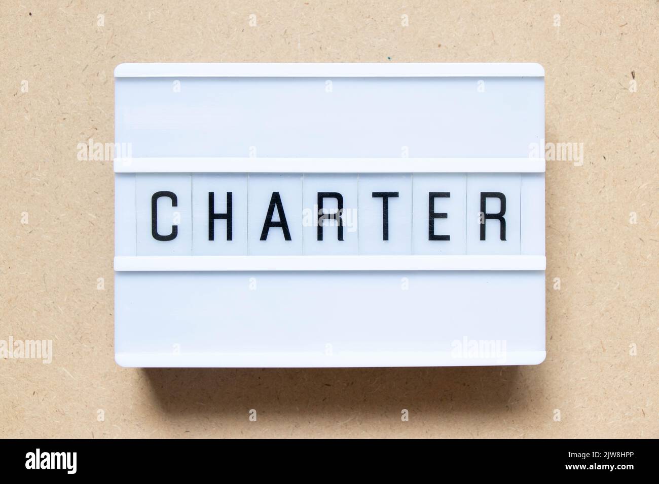 Lightbox with word charter on wood background Stock Photo