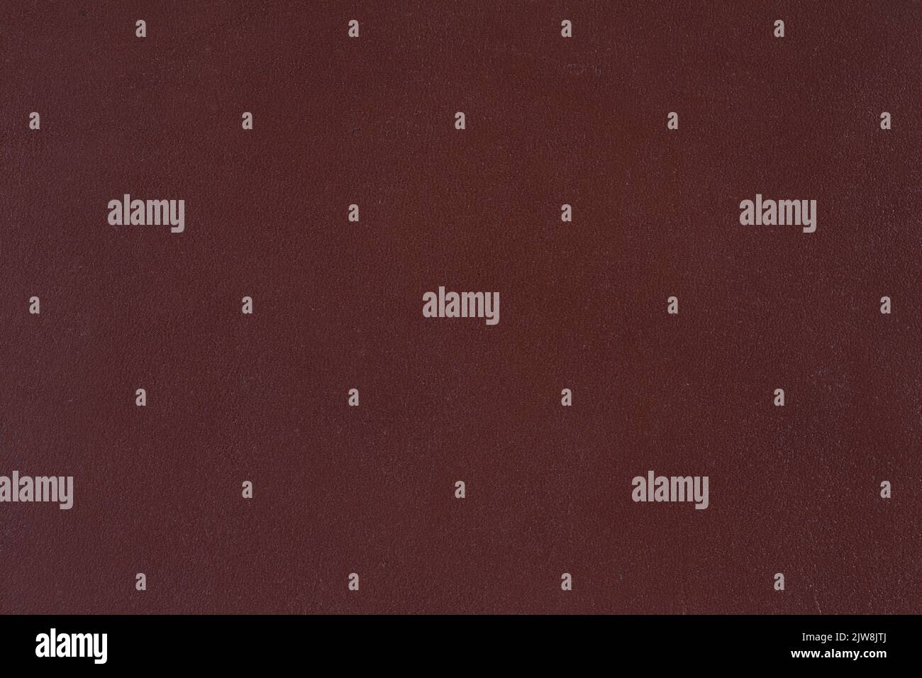 Dark brown natural leather background or texture. Stock Photo