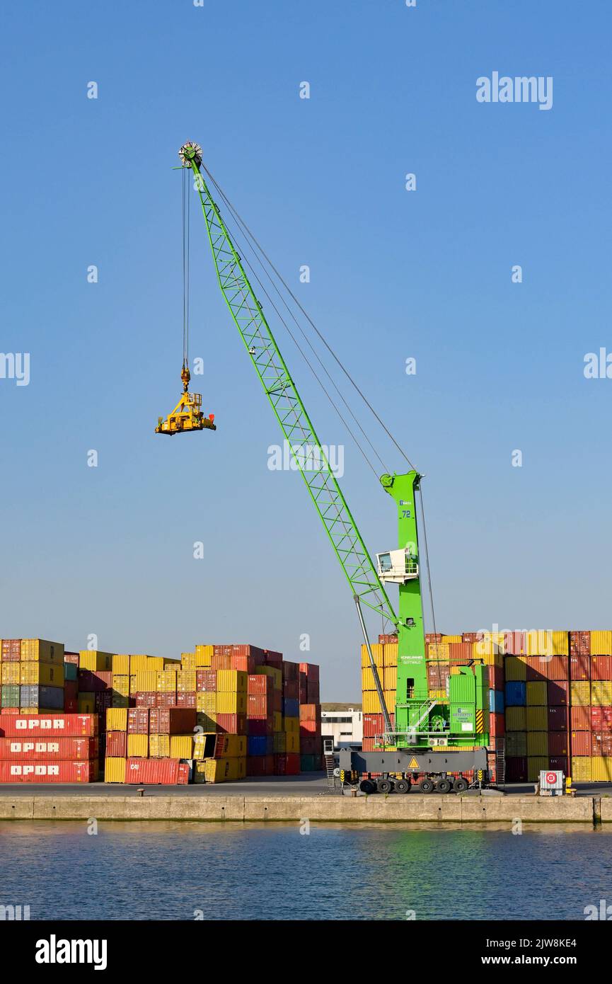 Antwerp, Belgium August 2022 Crane and shipping containers stored on